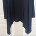 Bryn Walker black striped long sleeve blouse asymmetrical hems oversized