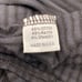 Bryn Walker black striped long sleeve blouse asymmetrical hems oversized