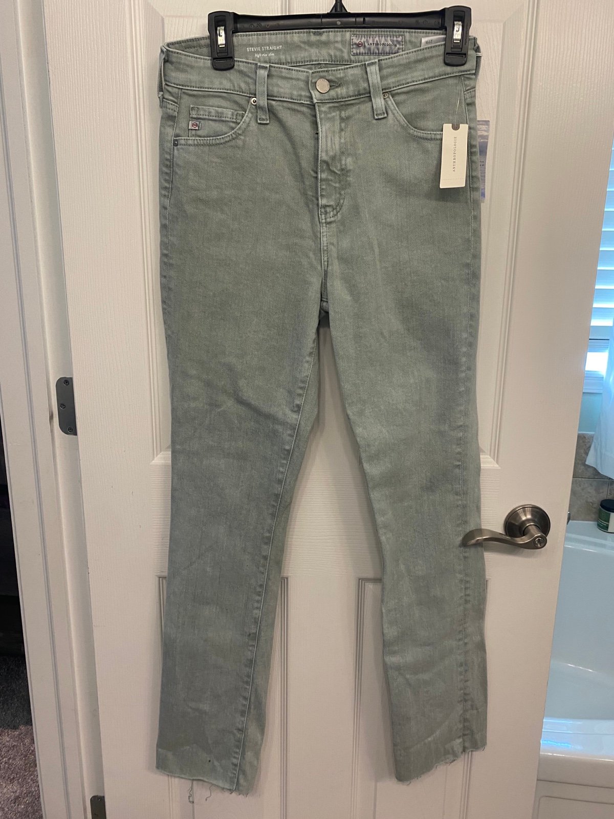 Anthropologie AG light wash denim. Stevie straight leg size 27R