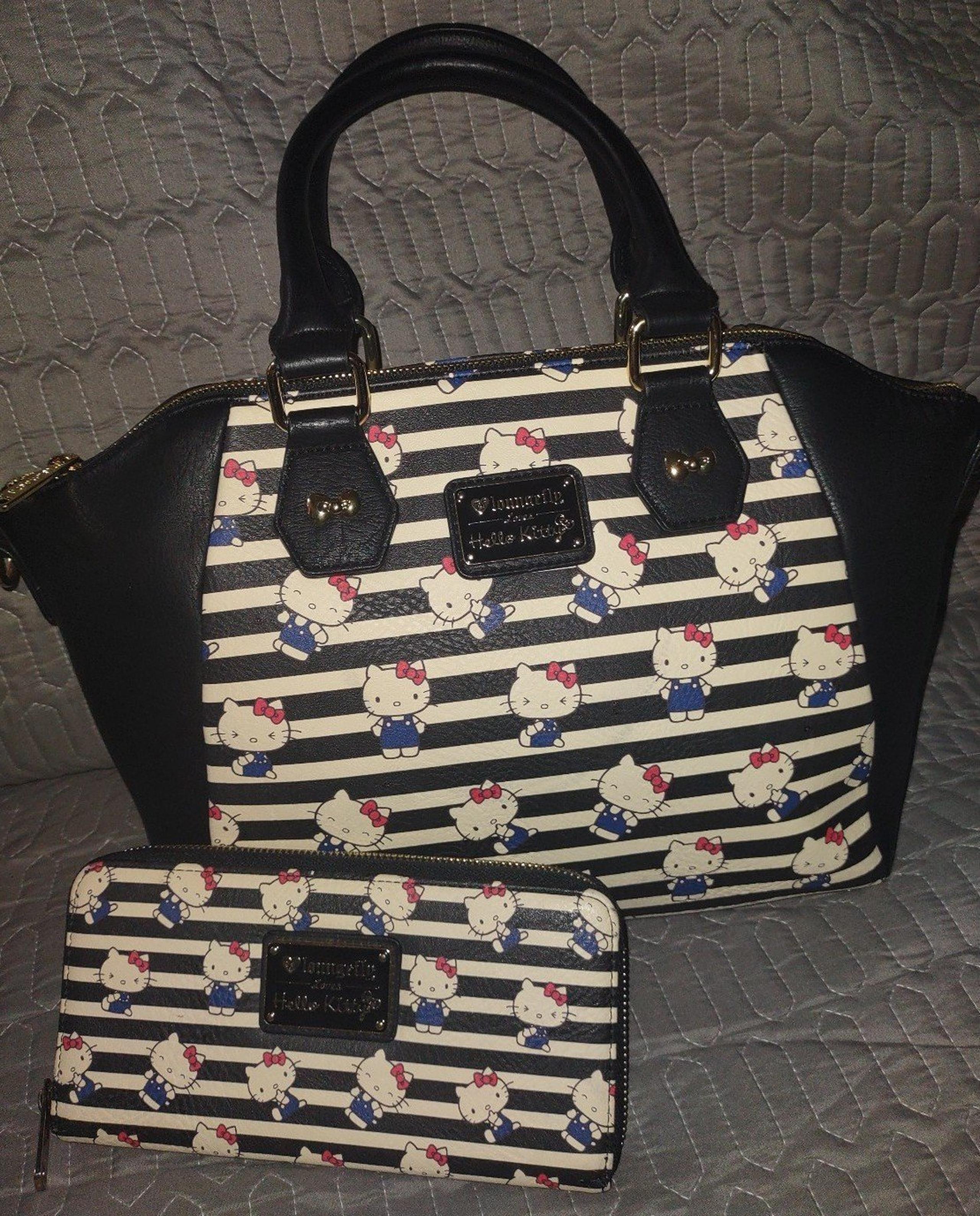 Rare Hello Kitty Loungefly purse and wallet set w/ flaws.