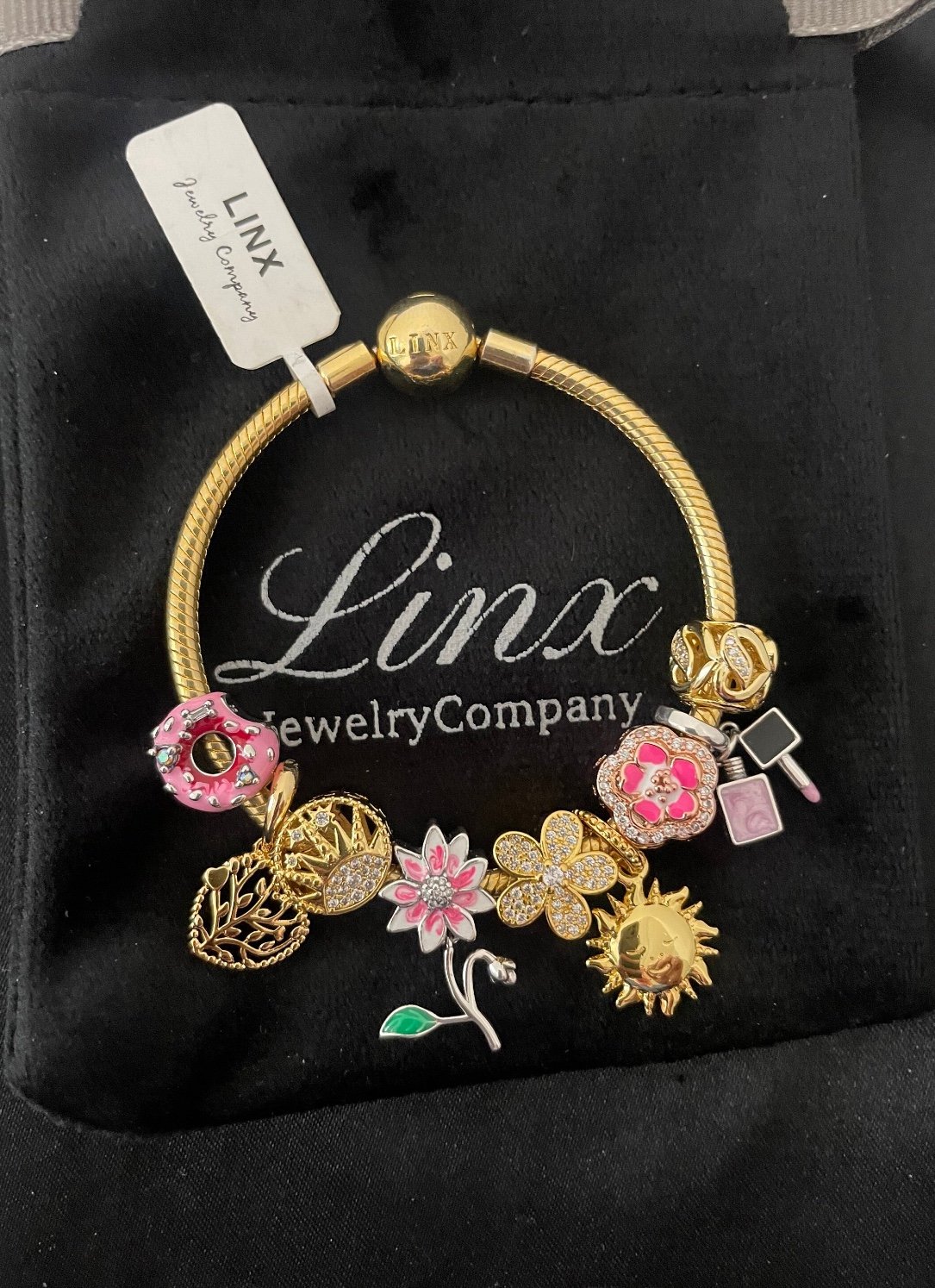 Linx Yellow Gold Bracelet with Gold and Pink Themed Charms