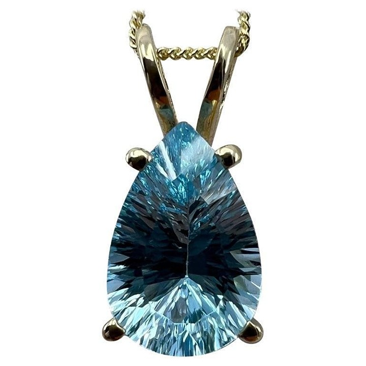 4.10Ct Natural Pear Shape Concave Cut Blue Topaz Solitaire Pendant Necklace 14k