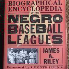 THE BIOGRAPHICAL ENCYCLOPEDIA OF THE NEGRO BASEBALL LEAGUES (Softcover Book)