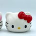 Hello Kitty Sanrio Co. Ltd. Salt & Pepper Shaker Set 2012 Pink & Red Bows NWOB