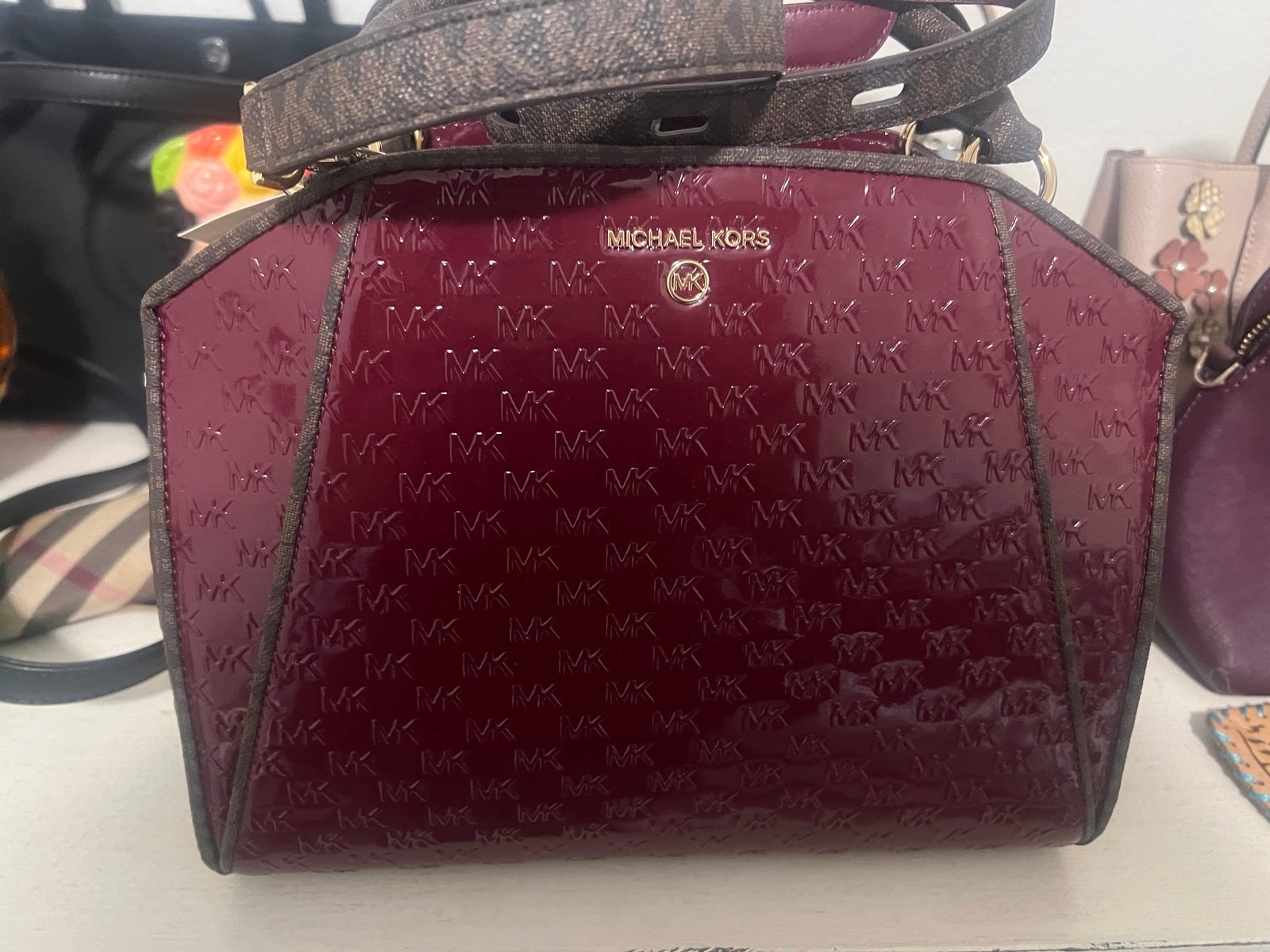Brand new Michael Kors Plum purse