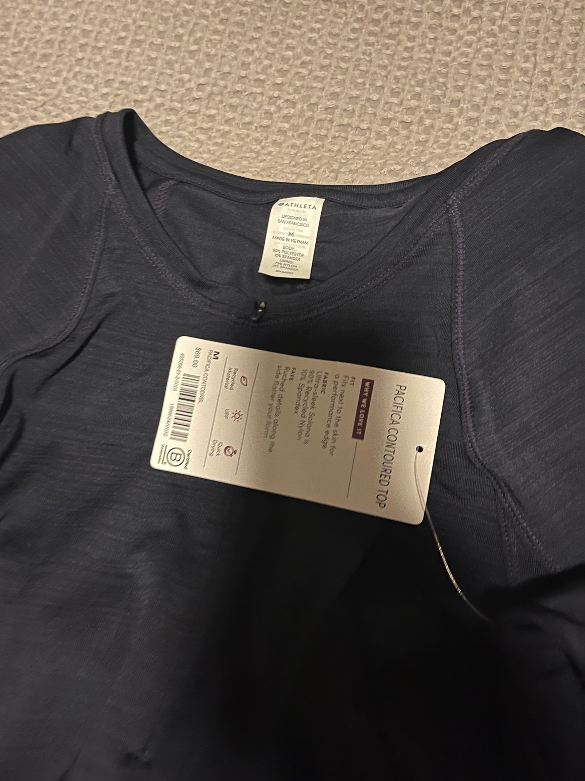 4- Women’s Athleta long sleeve swim