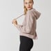 LULULEMON X BARRY'S HEATHERED RED DUST STRONGER AS ONE CROPPED HOODIE