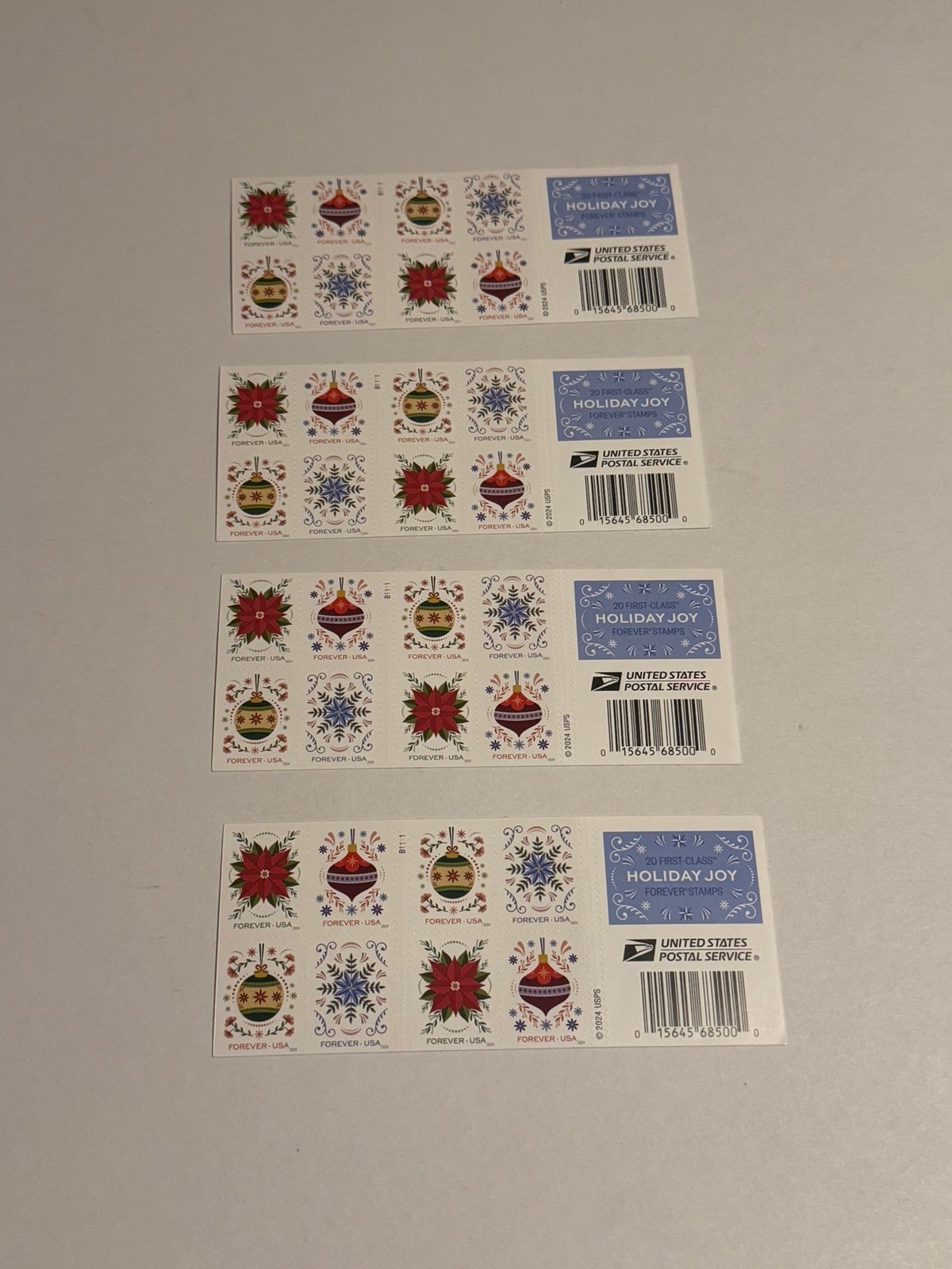 Lot of (4) Book of 20 Holiday Joy Stamps (TOTAL OF 80 FOREVER STAMPS) USPS