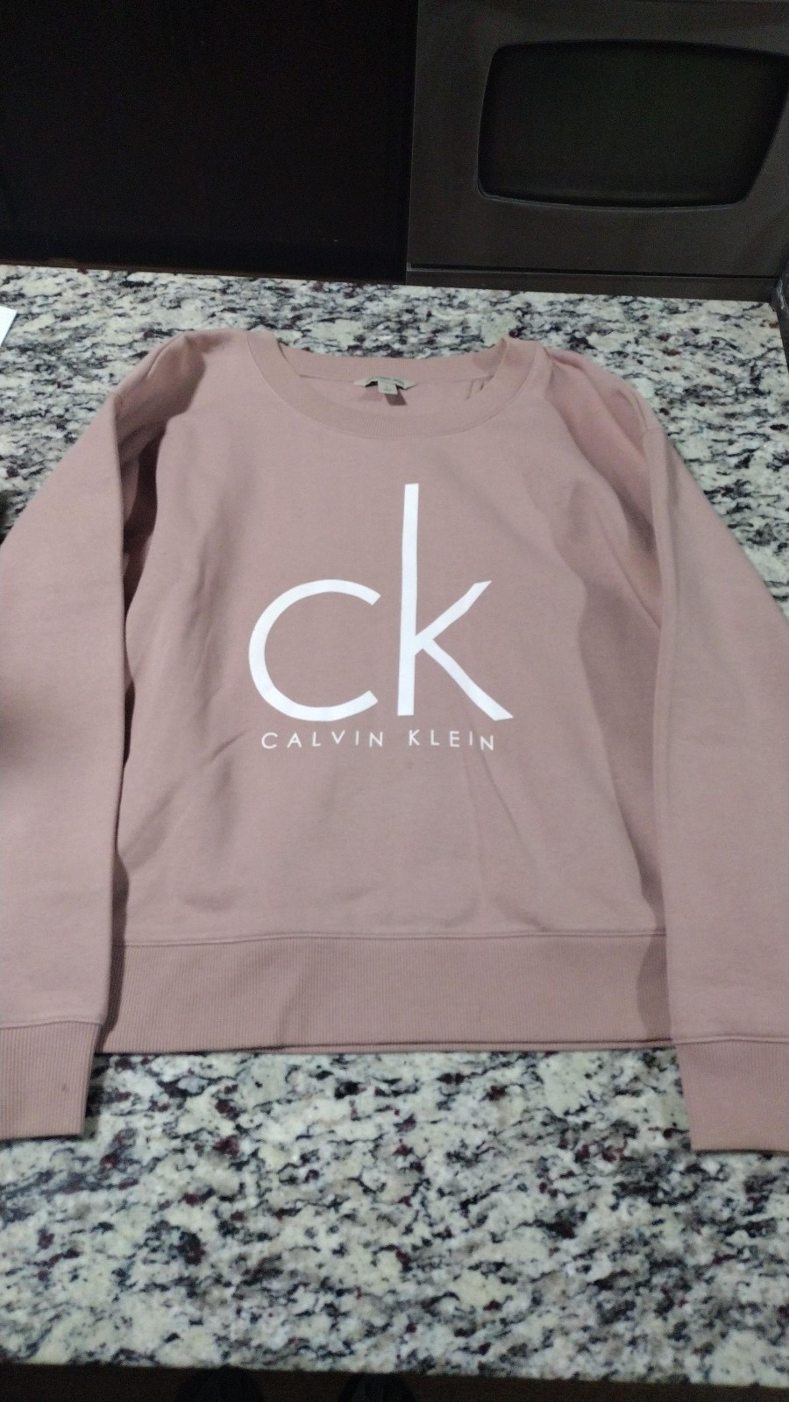 Pink Calvin Klein sweater