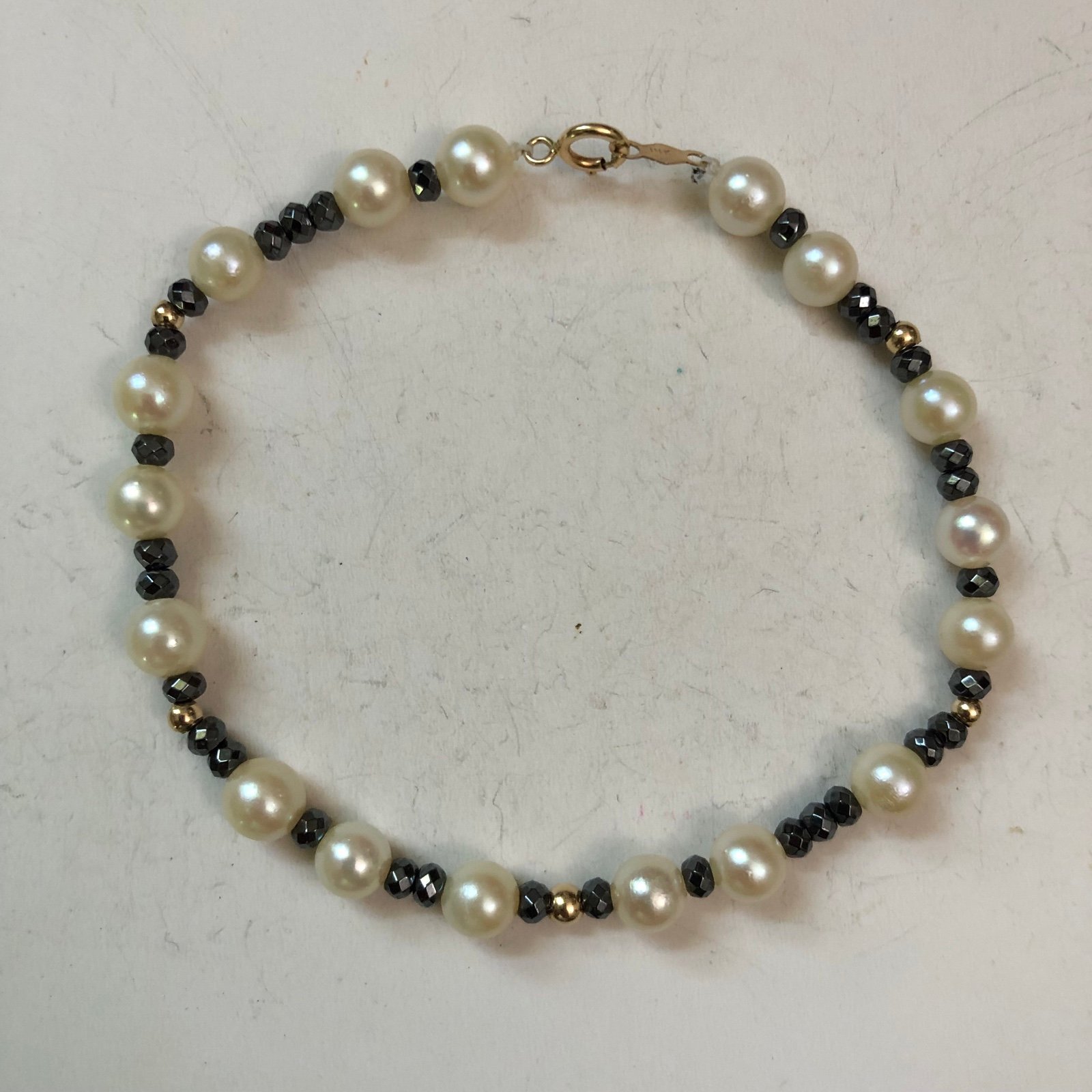 Unique handmade genuine Akoya pearl and hematite bracelet in 14k gold 7.5”