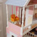 KidKraft Savannah Wooden Dollhouse, Over 4 feet Tall with Porch Swing and 14 Acc