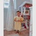 KidKraft Savannah Wooden Dollhouse, Over 4 feet Tall with Porch Swing and 14 Acc