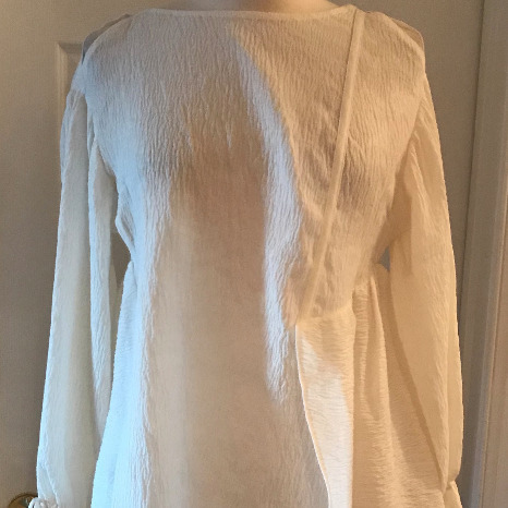 3.1 PHILLIP LIM TOP WITH RUFFLE HEM.