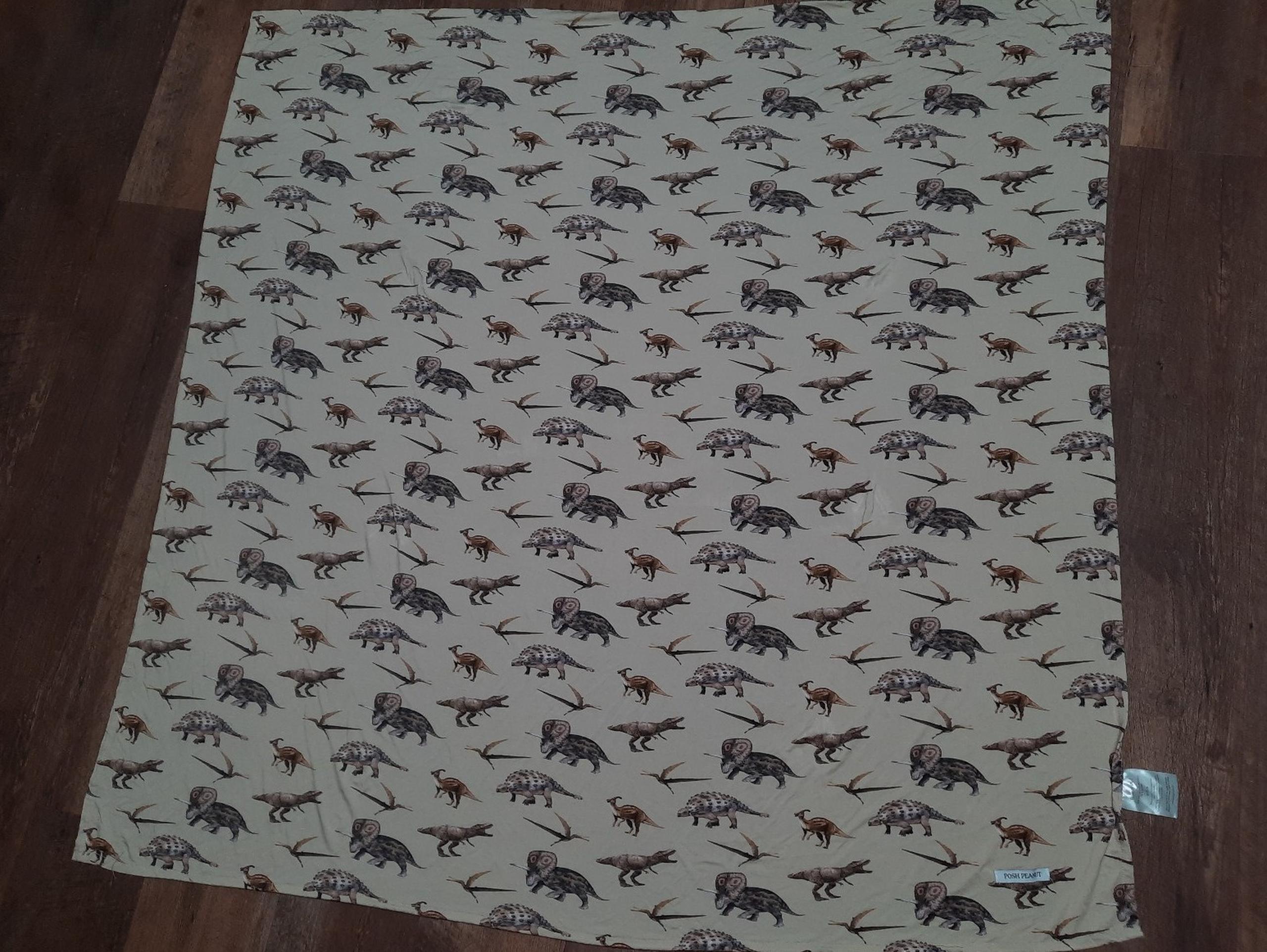 Posh peanut "vintage dino" print swaddle blanket