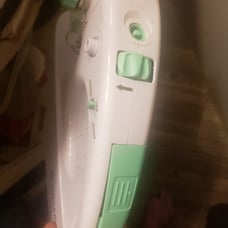 Handheld sewing machine