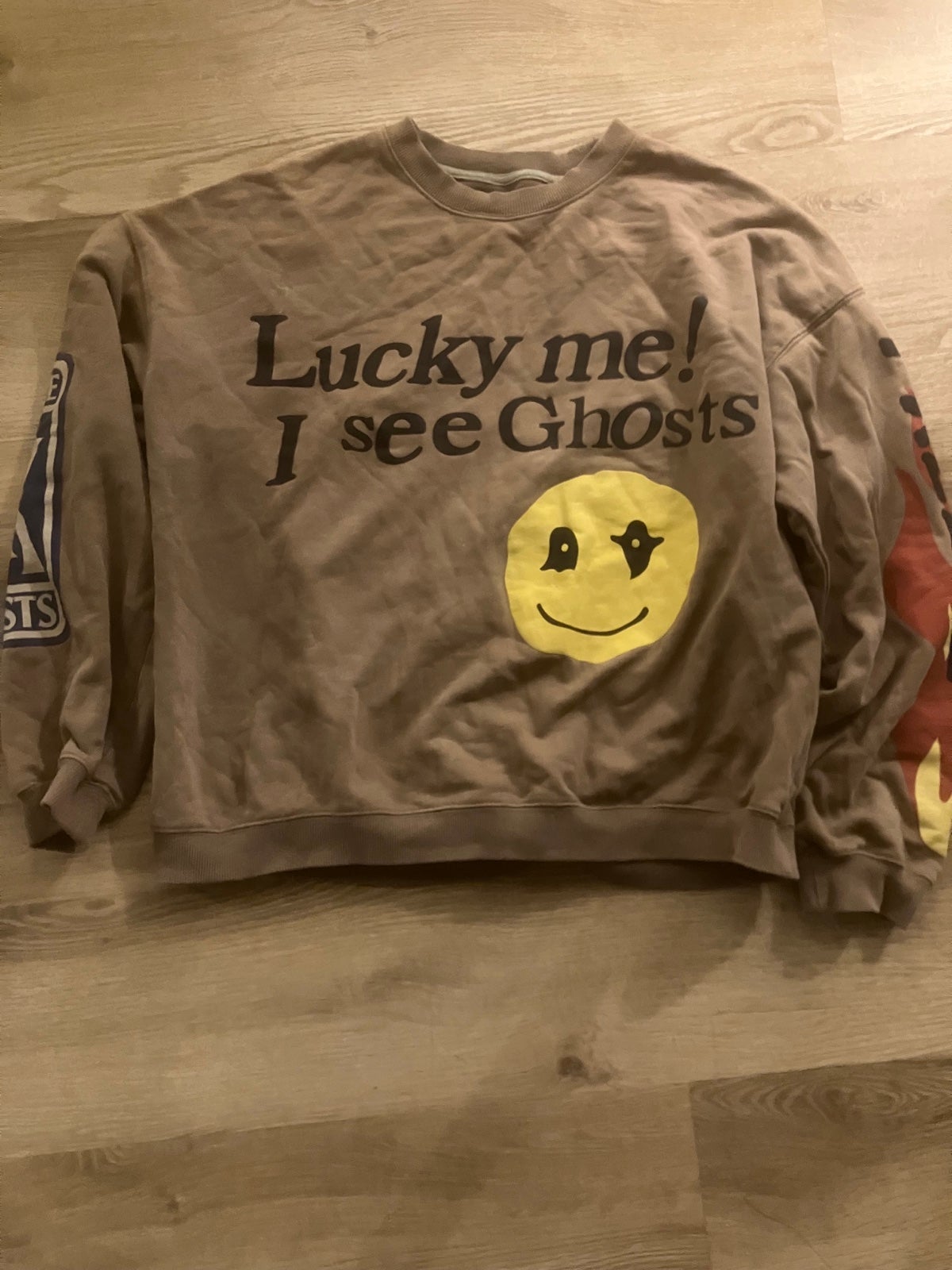 kanye west sweater fits like a medium