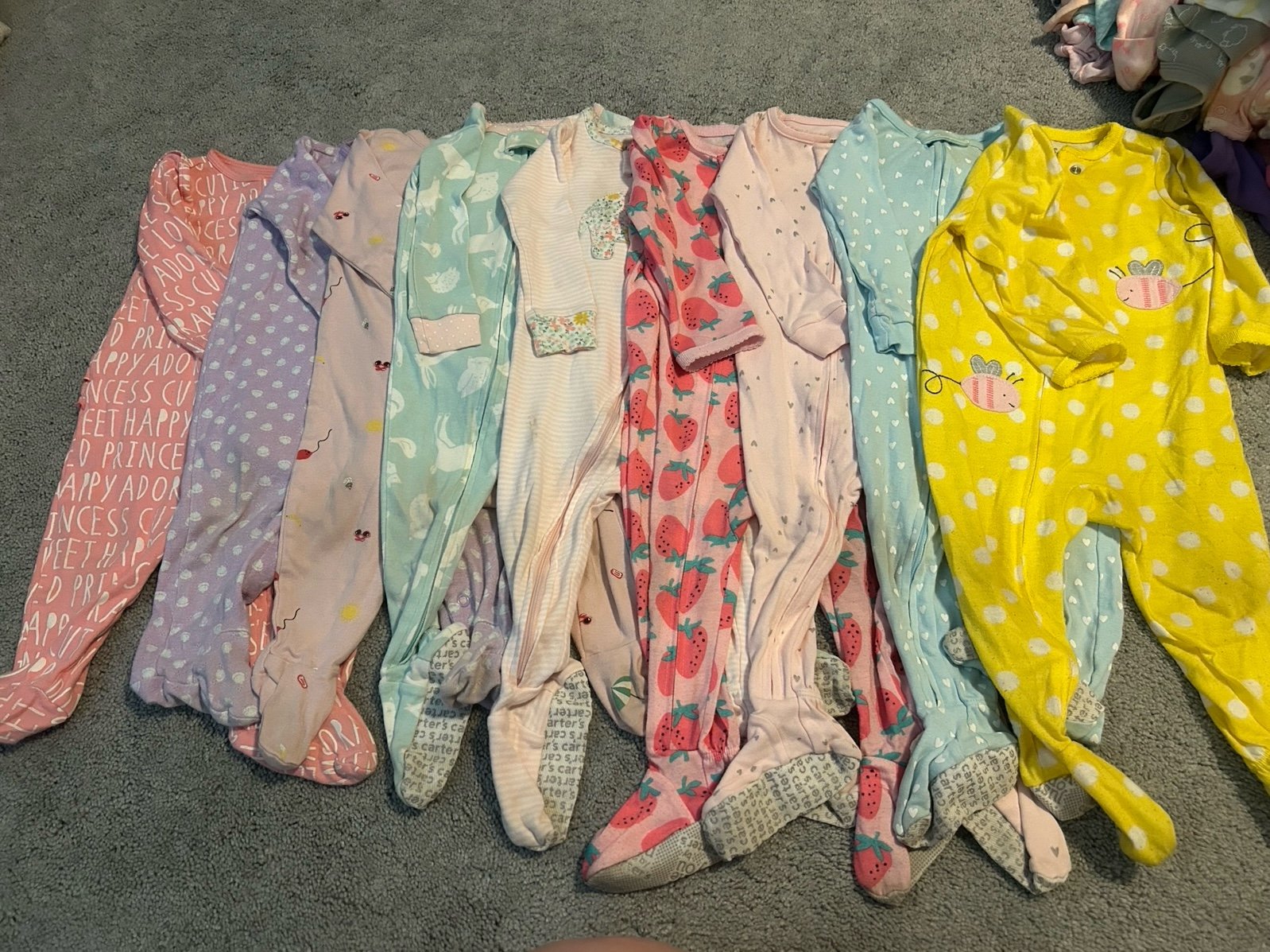 Lot of 9 Carter's, baby Girl Footie Pajamas 9- 12 month