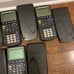 5 texas instruments ti-83 plus calculators for parts