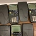 5 texas instruments ti-83 plus calculators for parts