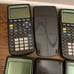 5 texas instruments ti-83 plus calculators for parts