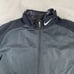 Nike Golf Wind Jacket Men XL Black Stretch Windwear Full Zip Windproof Reflectv