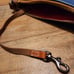 Dooney & Bourke Pebble Grain Letter Carrier Crossbody Midnight Blue
