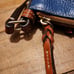 Dooney & Bourke Pebble Grain Letter Carrier Crossbody Midnight Blue