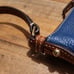 Dooney & Bourke Pebble Grain Letter Carrier Crossbody Midnight Blue
