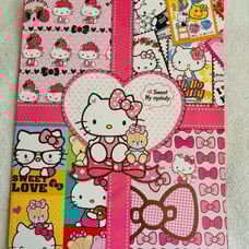 Hello Kitty gift wrap book *hard to find piece*