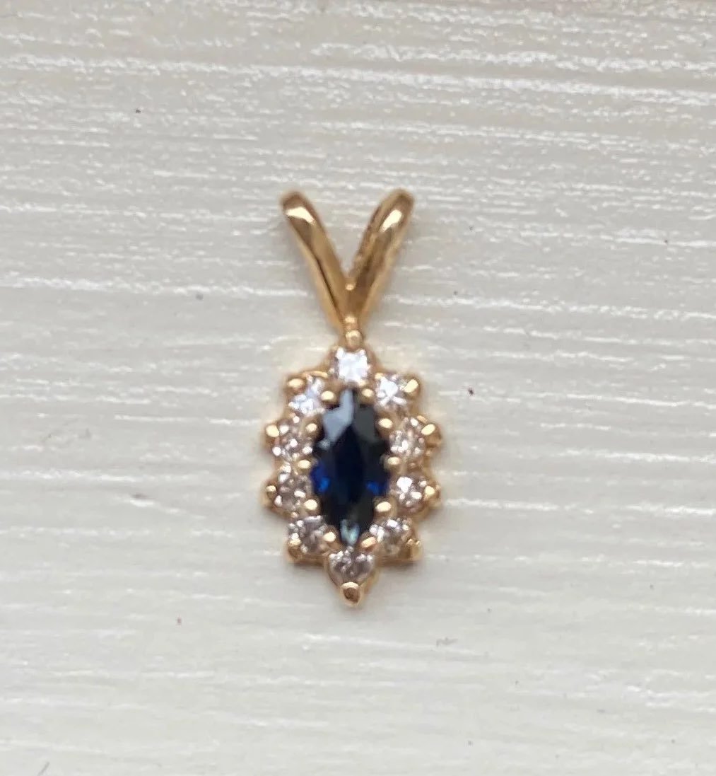 Genuine sapphire and diamond pendant