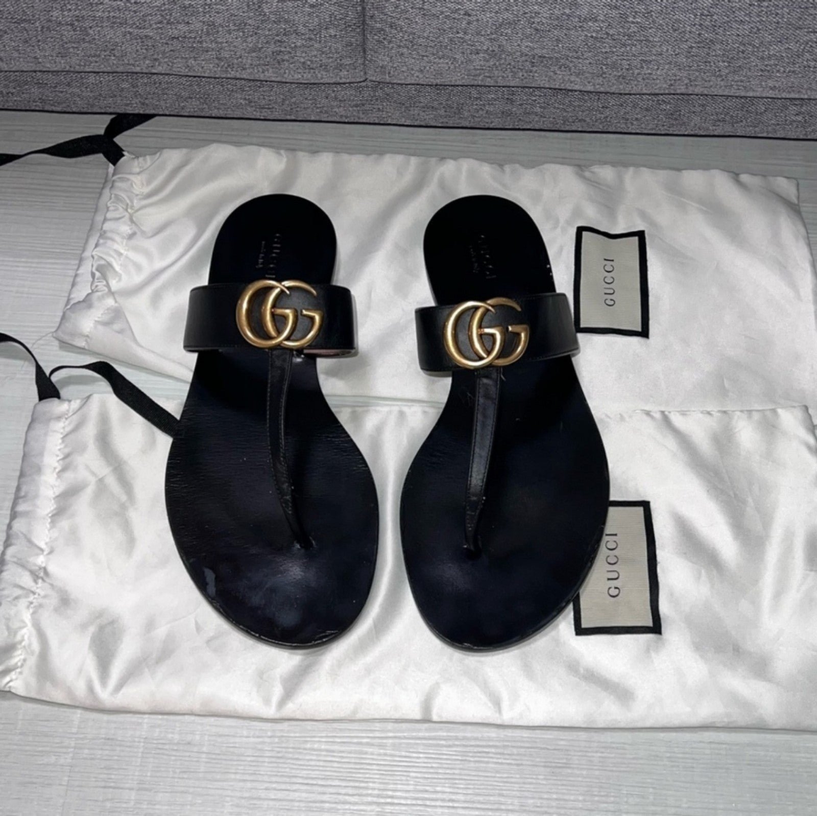 100% Authentic Gucci GG black and gold leather flat sandals