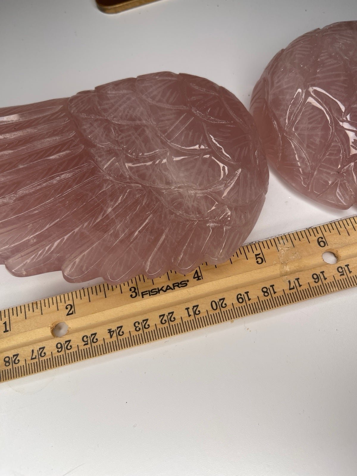 Rose quartz crystal wings on stand