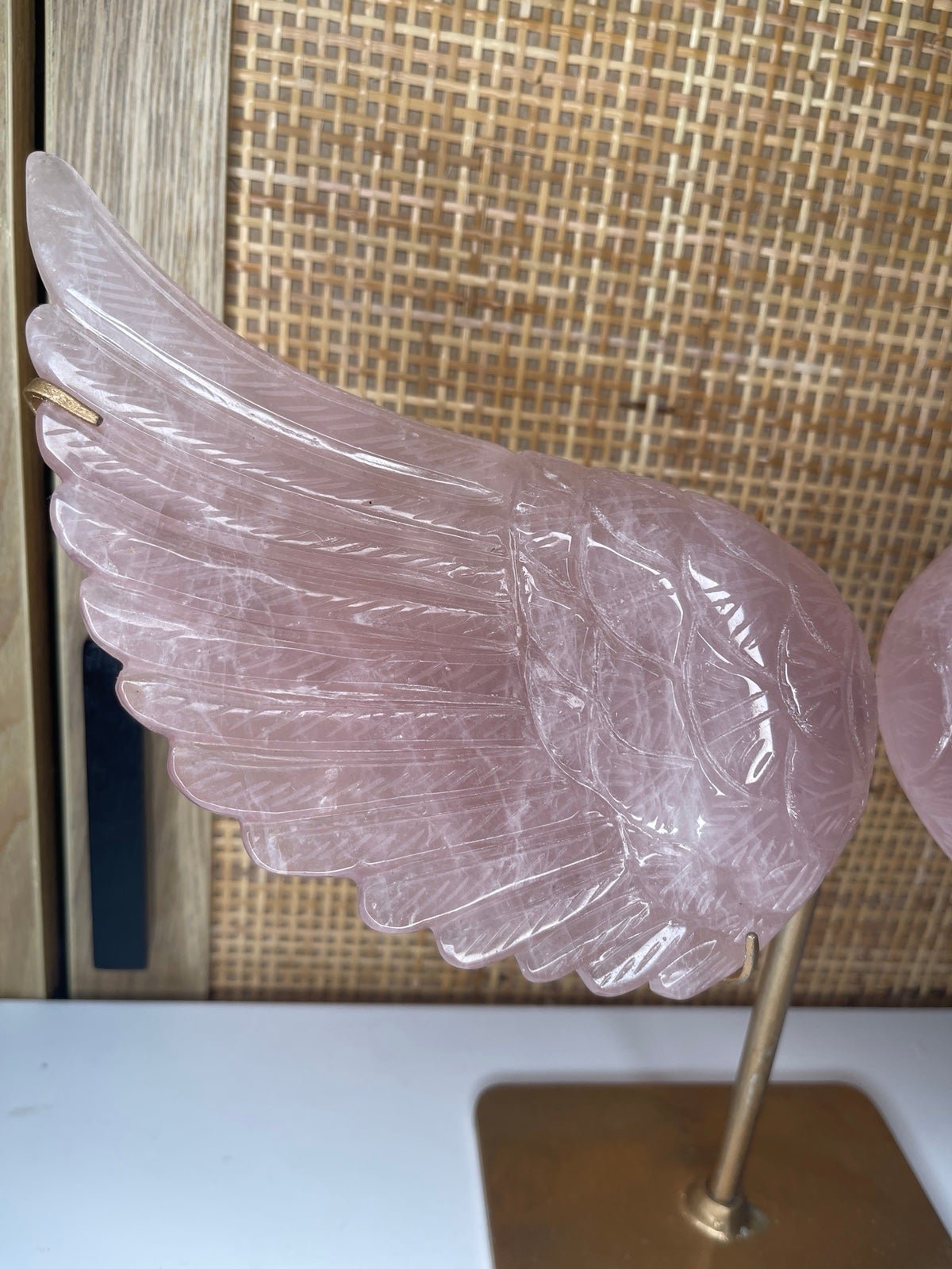 Rose quartz crystal wings on stand