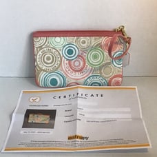 Womens Coach clutch purse with COA