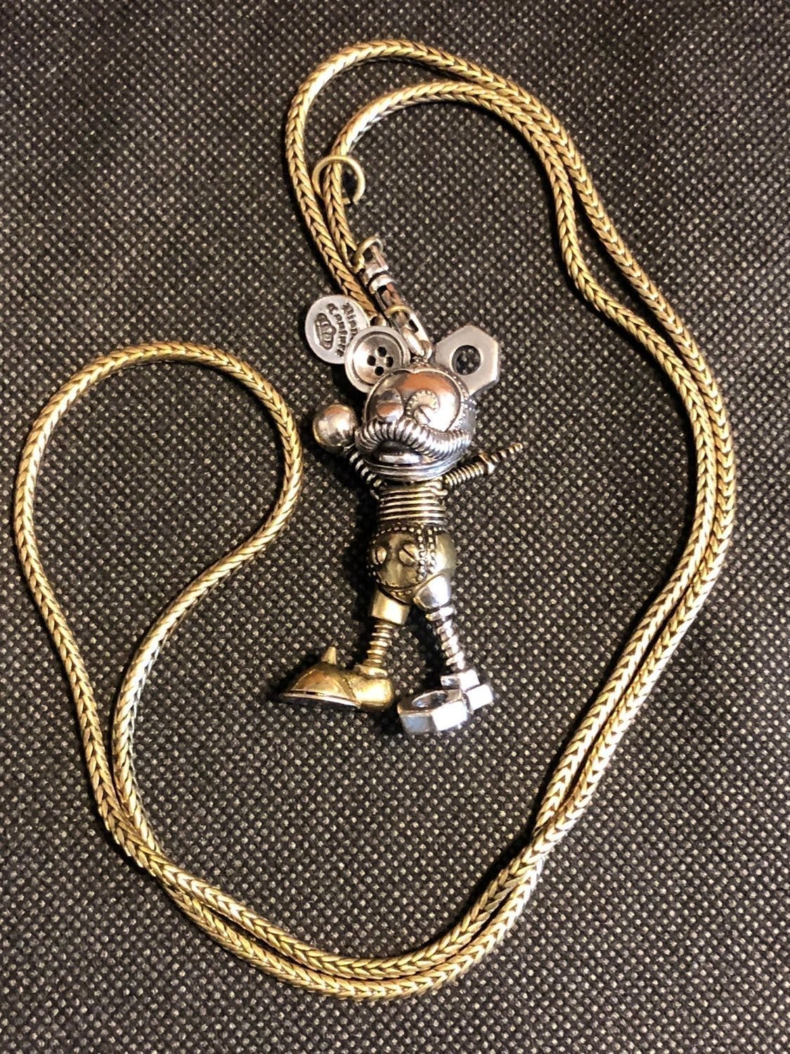 Disney couture dr x Mickey robot necklace 1 arm missing