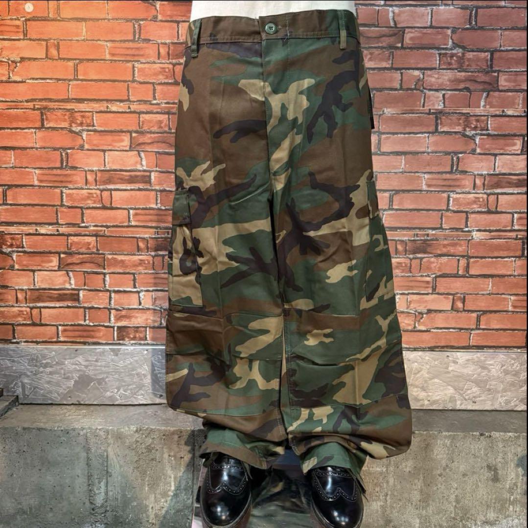 Brand new, unused ROTHCO BDU cargo pants, military woodland camo.