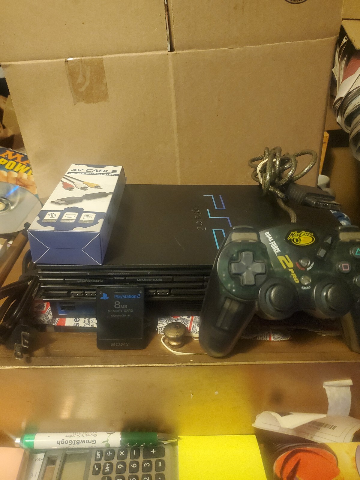 PlayStation 2 console + 2 PS1 games