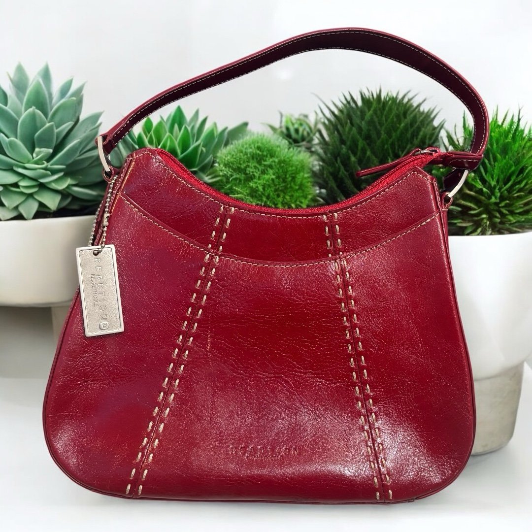 Kenneth Cole Reaction red purse. About 8x10x3. EUC