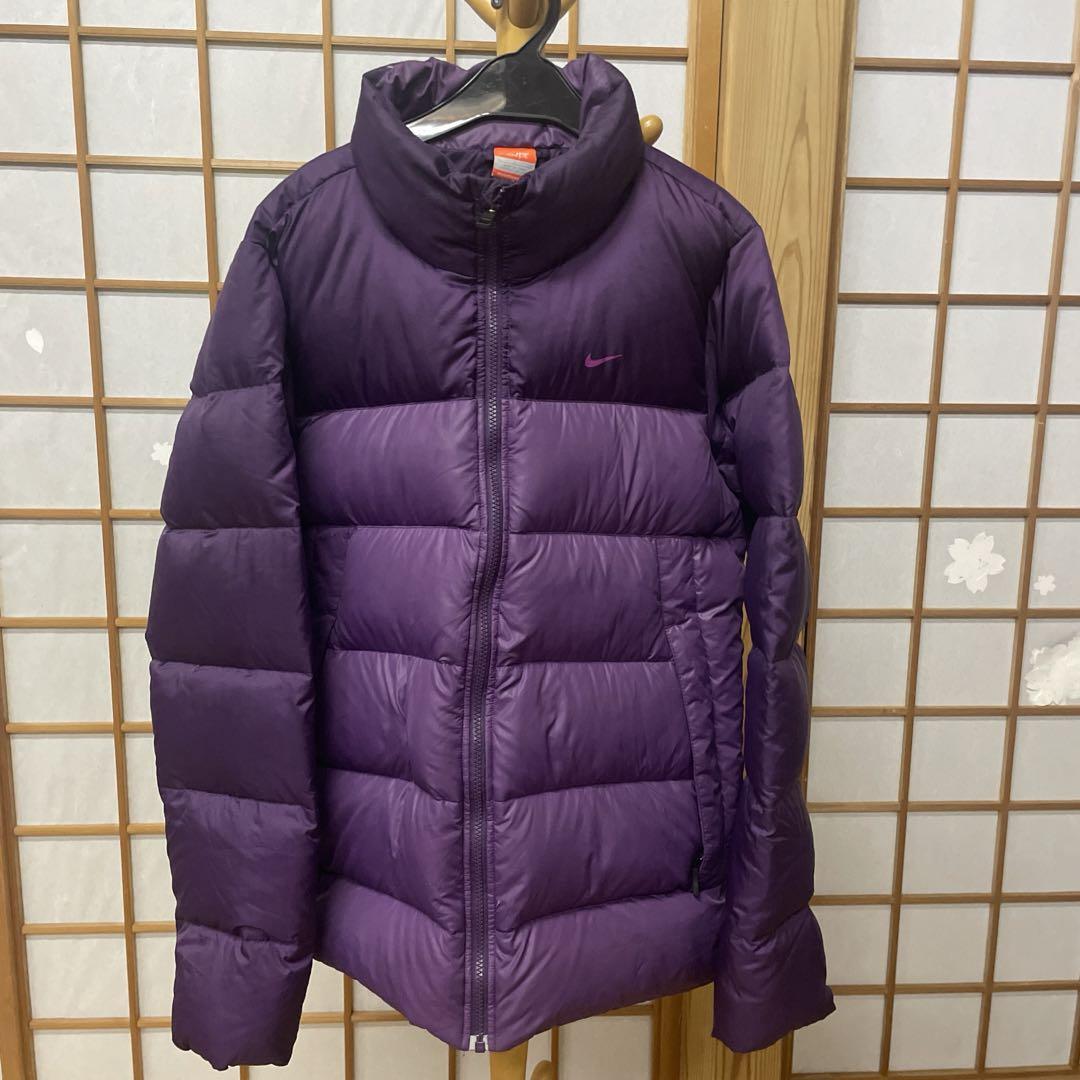 Nike athletic department purple down jacket.