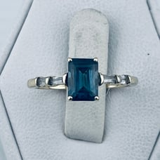 Vintage art, deco, London, blue topaz, and diamond ring 10 karat yellow gold