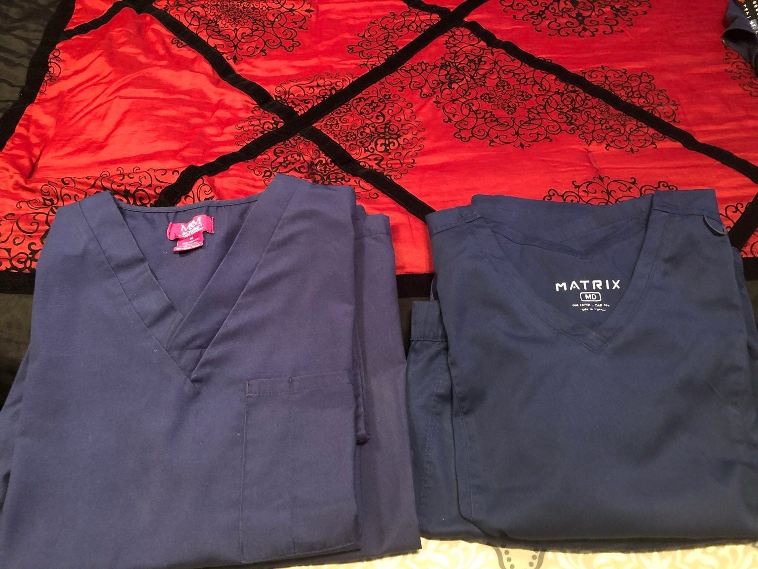 2 sets of Nursing scrubs
