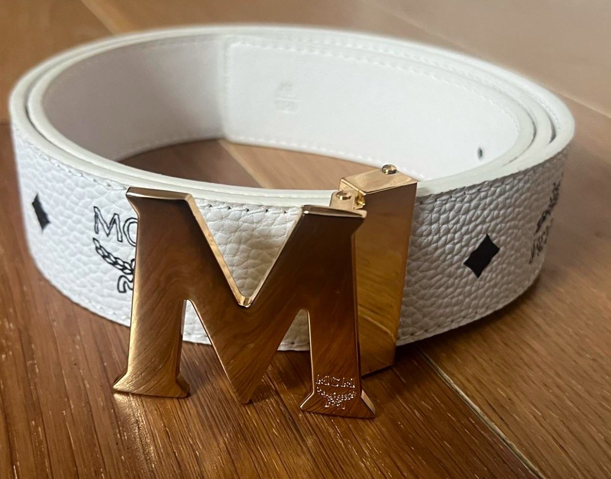 large white and gold mcm belt