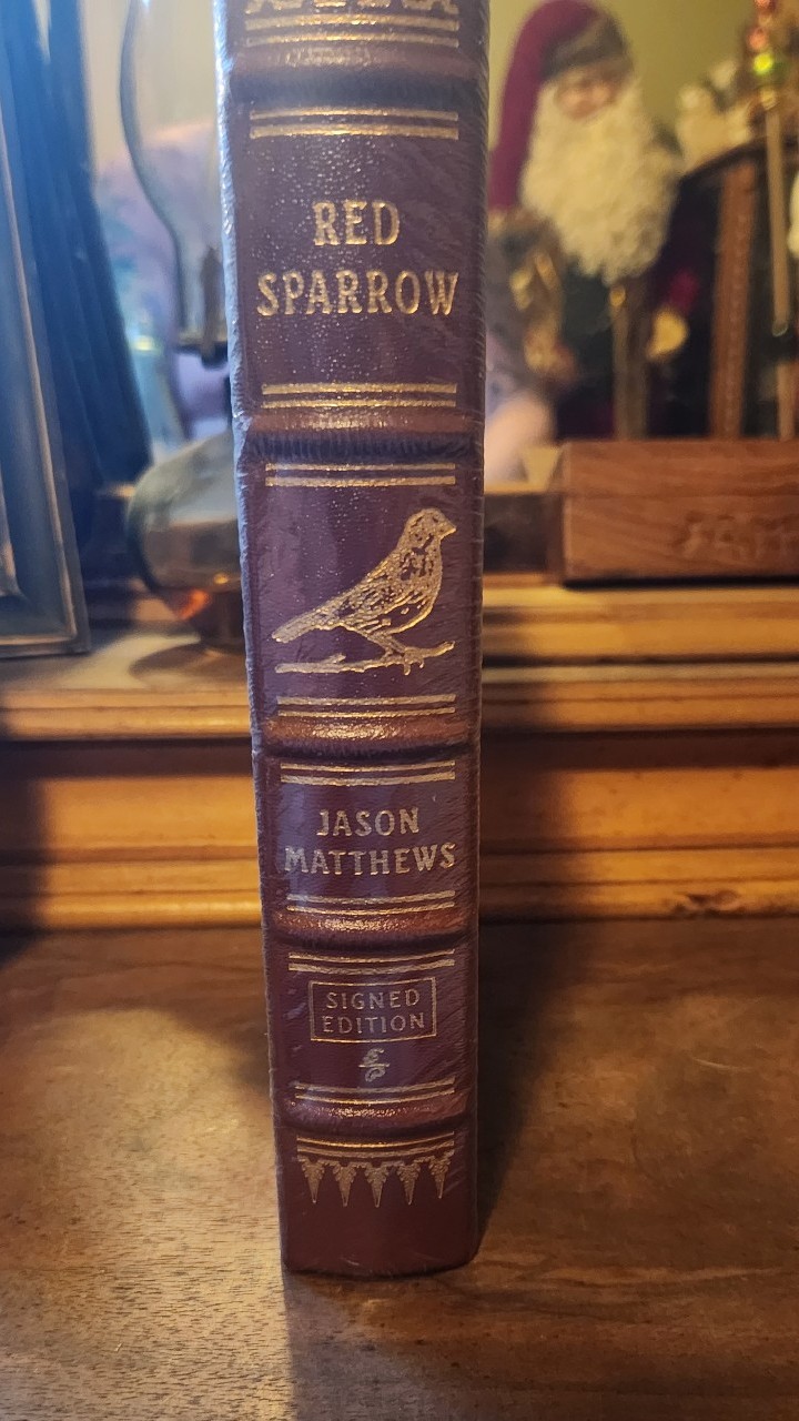 Easton press, red sparrow by Jason Matthews
