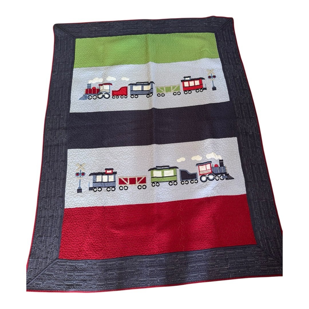 Frolic Quilted Boys Trains Design Comforter measures 52 wide 79 long