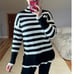 Philosophy: Mock Neck Black and White Color blocked Stripped Sweater