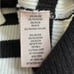 Philosophy: Mock Neck Black and White Color blocked Stripped Sweater