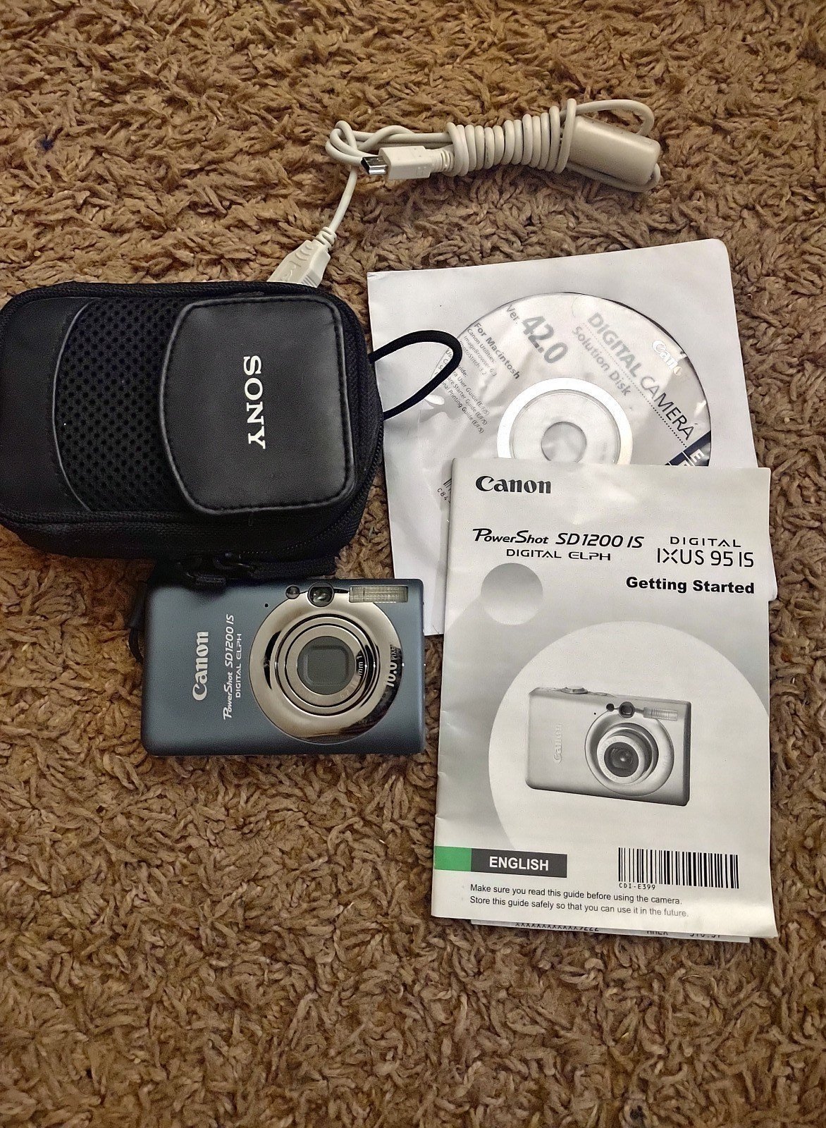 Canon PowerShot SD1200 IS Digital ELPH 10.0MP 3x Digital Camera - Gray