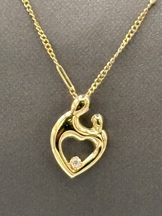 Ladies 14 Karat Yellow Gold Mother & Baby Charm & Chain