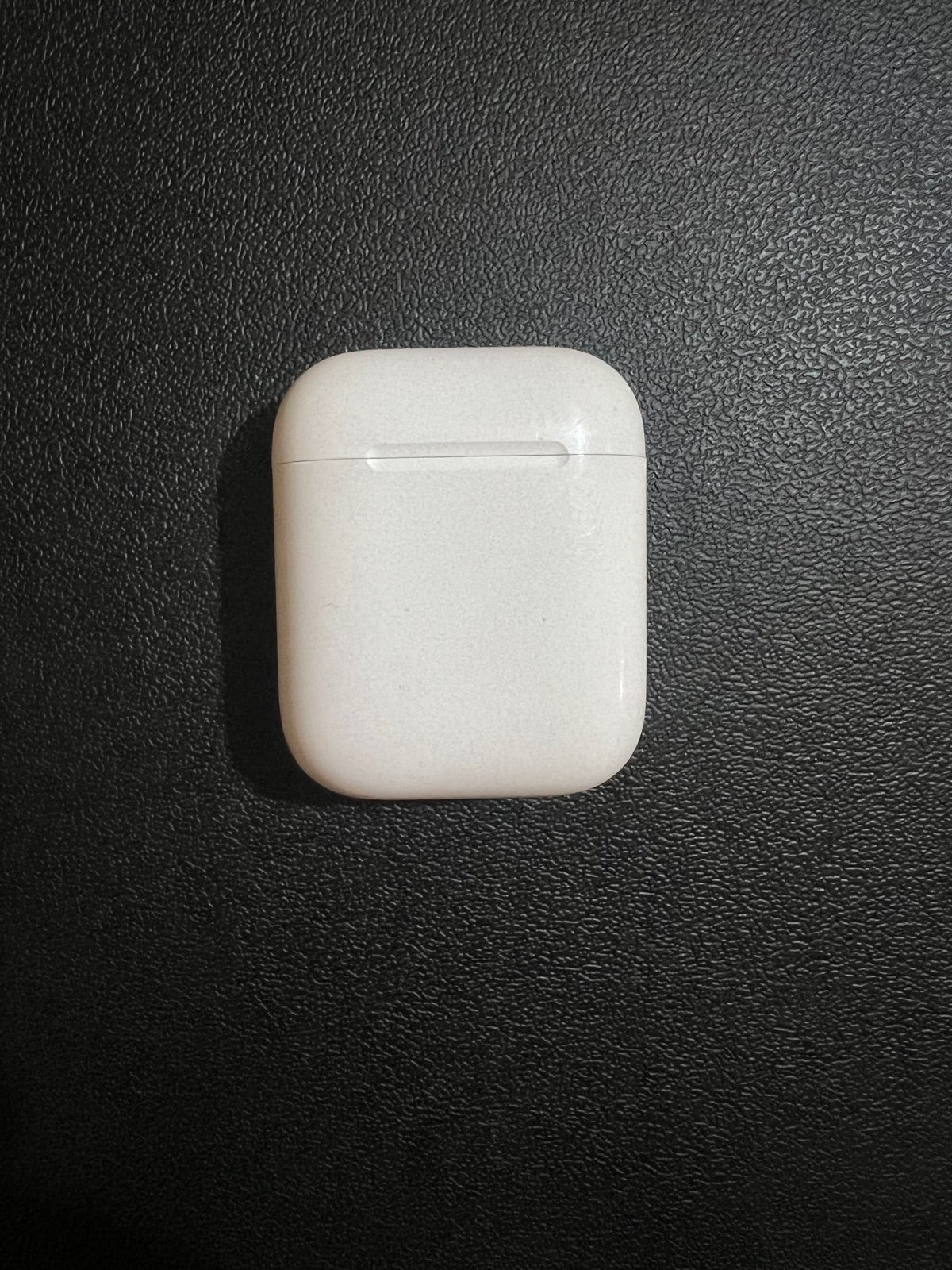 Apple AirPods with Charging Case (1st Generation)