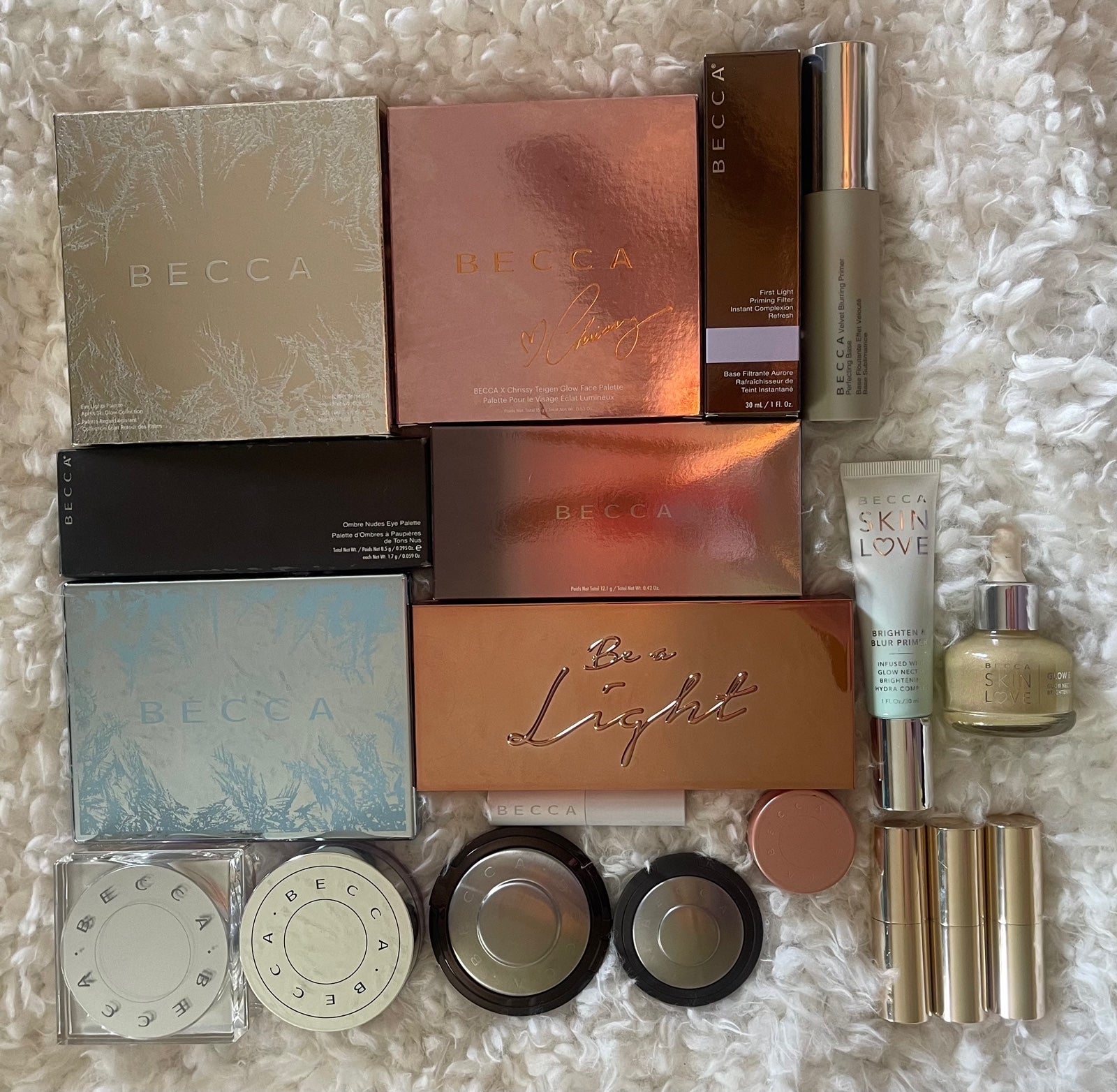 Becca cosmetics Bundle with 19 Pieces (new and used)